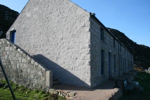 The kitchen dining room are the first door to the left.  Campers quarters further on.  Activity rooms upstairs.