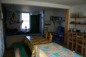 The dining roo with common room in the background.