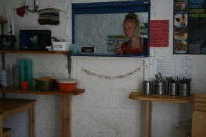 Mrs. Turkadactyl peers through the hatch, which leads to the kitchen