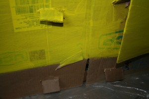 Here we see the other side with the tabs connecting the two pieces of cardboard.