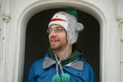 vienna08-83 This is at Schonnbrunn Palace. A group of tourists started to take pictures of Michael (the monkey toque) and I as they were walking by. Mrs. T caught me smiling for their cameras. Michael sure did garner a lot of attention in Austria.